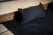 Rento Sauna-Stuhlbezug in schwarz und grau, 60x160cm, für komfortables Sitzen.
