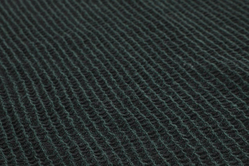 Dunkelgrünes Saunahandtuch 50x70 cm von Rento Kenno, ideal für Entspannung und Komfort.